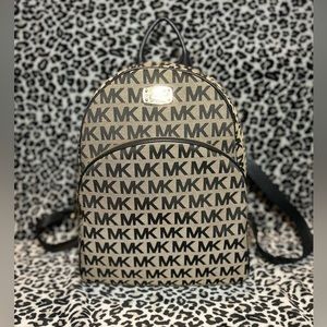 Micheal Kors backpack *beige and black* w/leather straps
